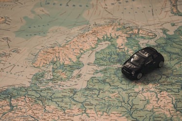 car on a map showing Norway